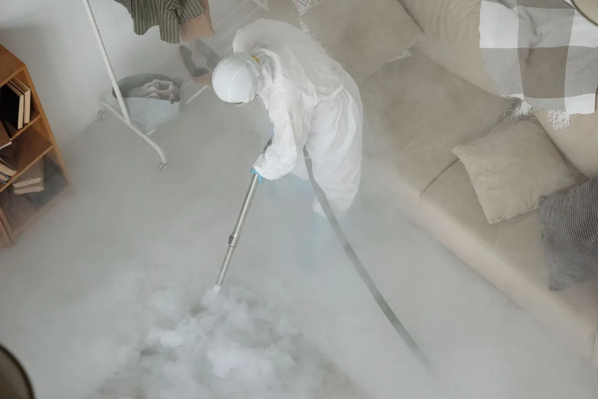 Biohazard cleanup technician in protective equipment, Castle Hill / Unionport, New York, NY